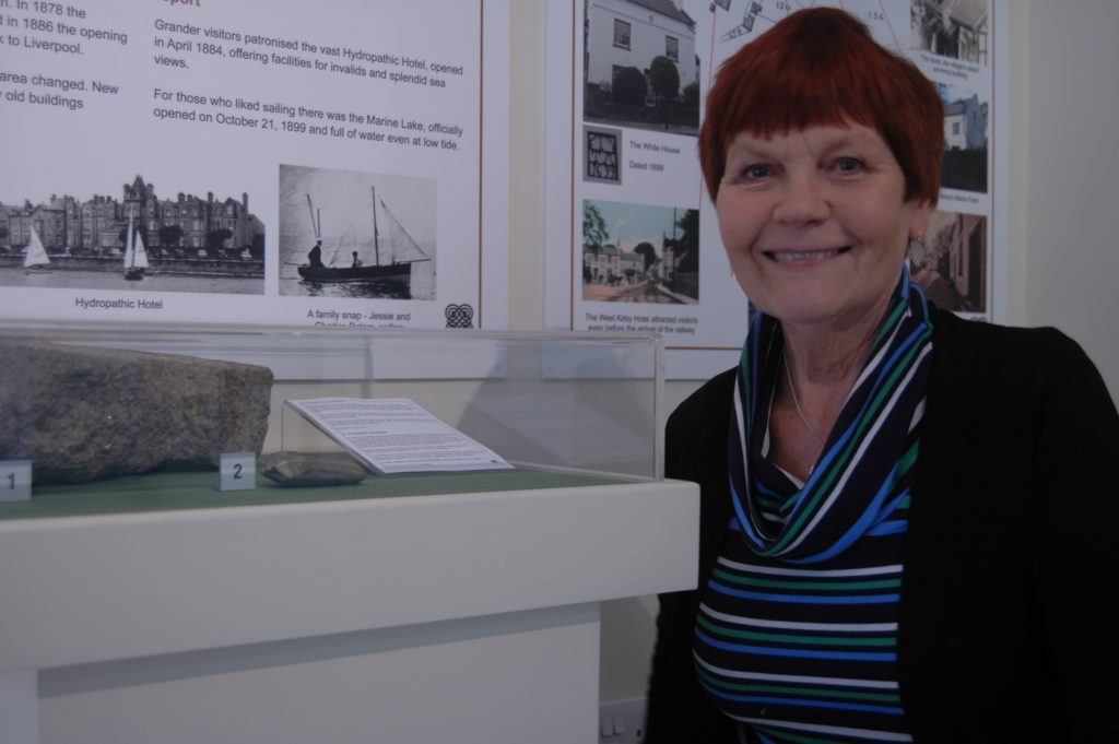Sue Jackson with her 5,000 year-old axe head exhibit