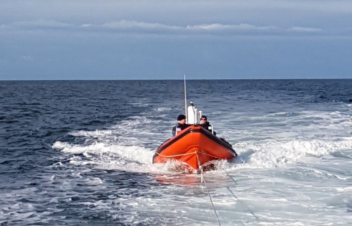 Dive boat Argo under tow by theHoylake lifeboat. Picture: RNLI/Peter Ruddell