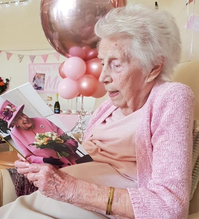 Muriel Dufton with her birthday card from HM The Queen