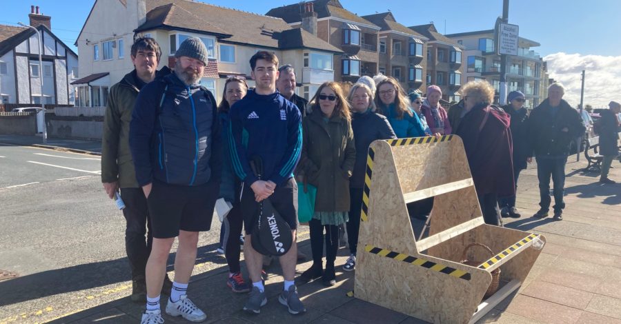 Concerned residents demonstrate mock up of new West Kirby flood wall