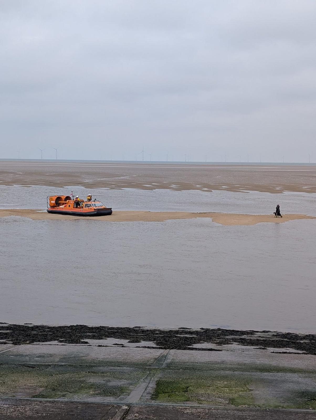 stranded_dog_walker_rescued_from_sandbank_by_hoylake_rnli_hovercraft