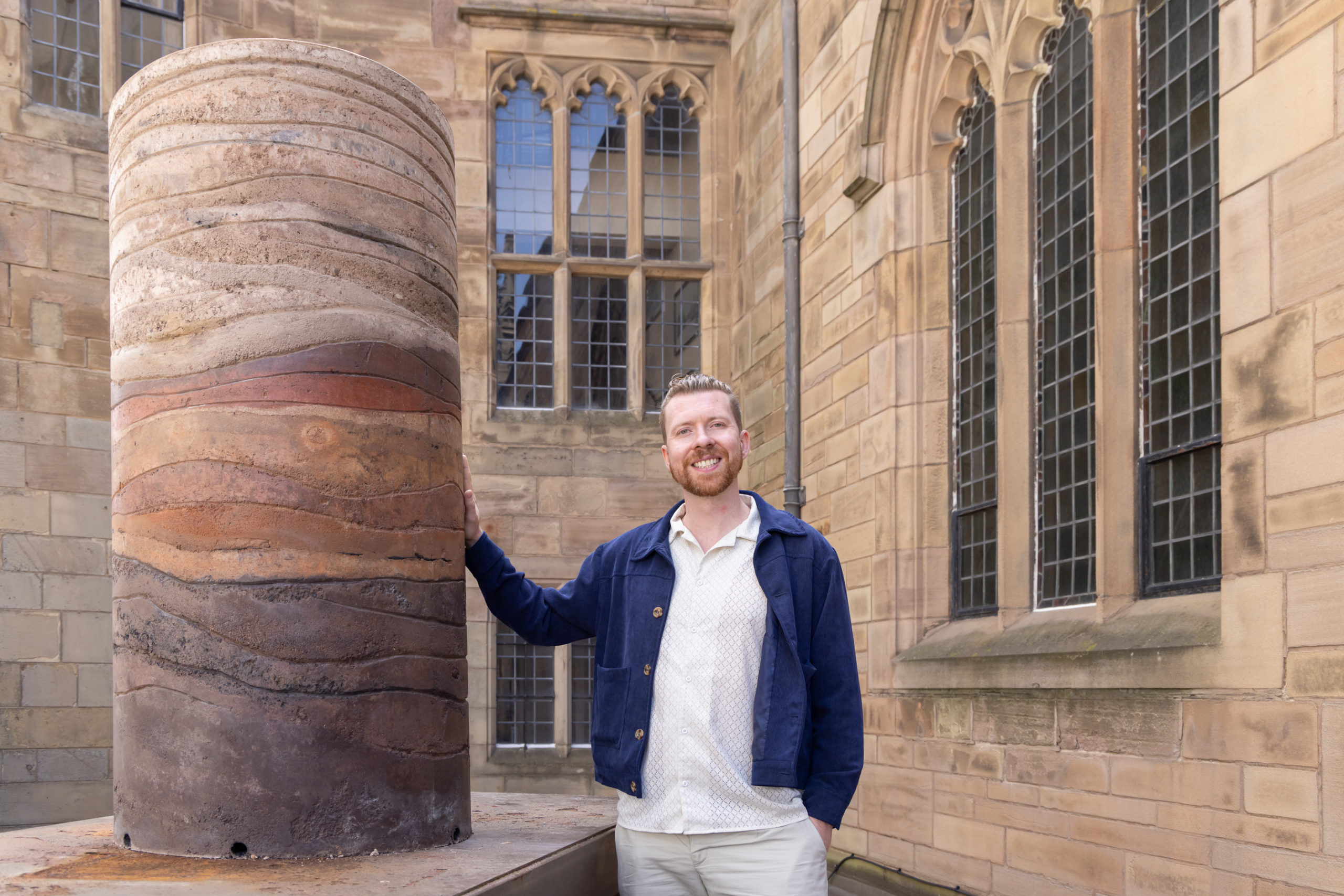 Artist Ben Stephenson with the sculpture - image by Adam Kendrick